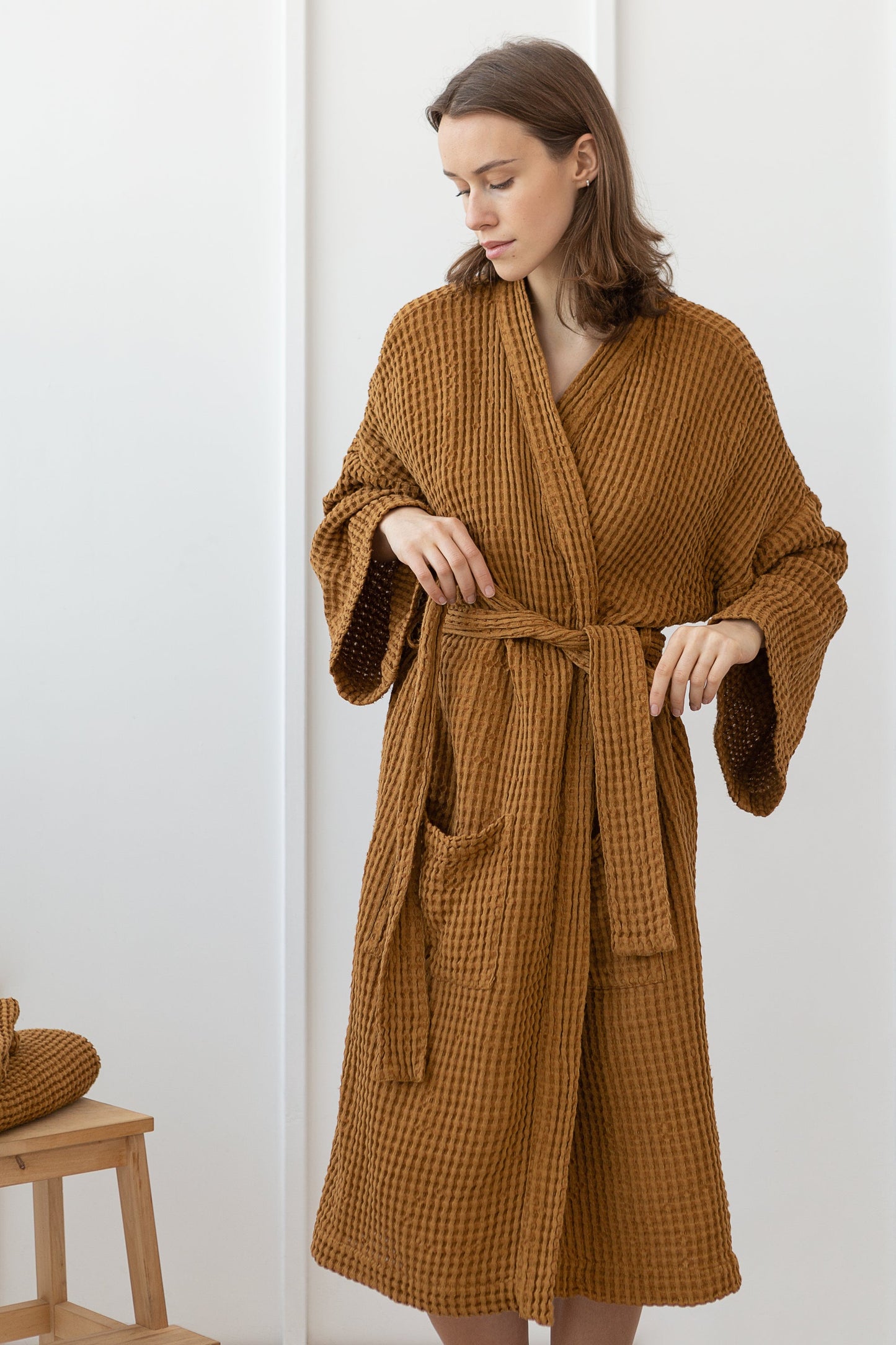 Set of linen waffle robes with towels