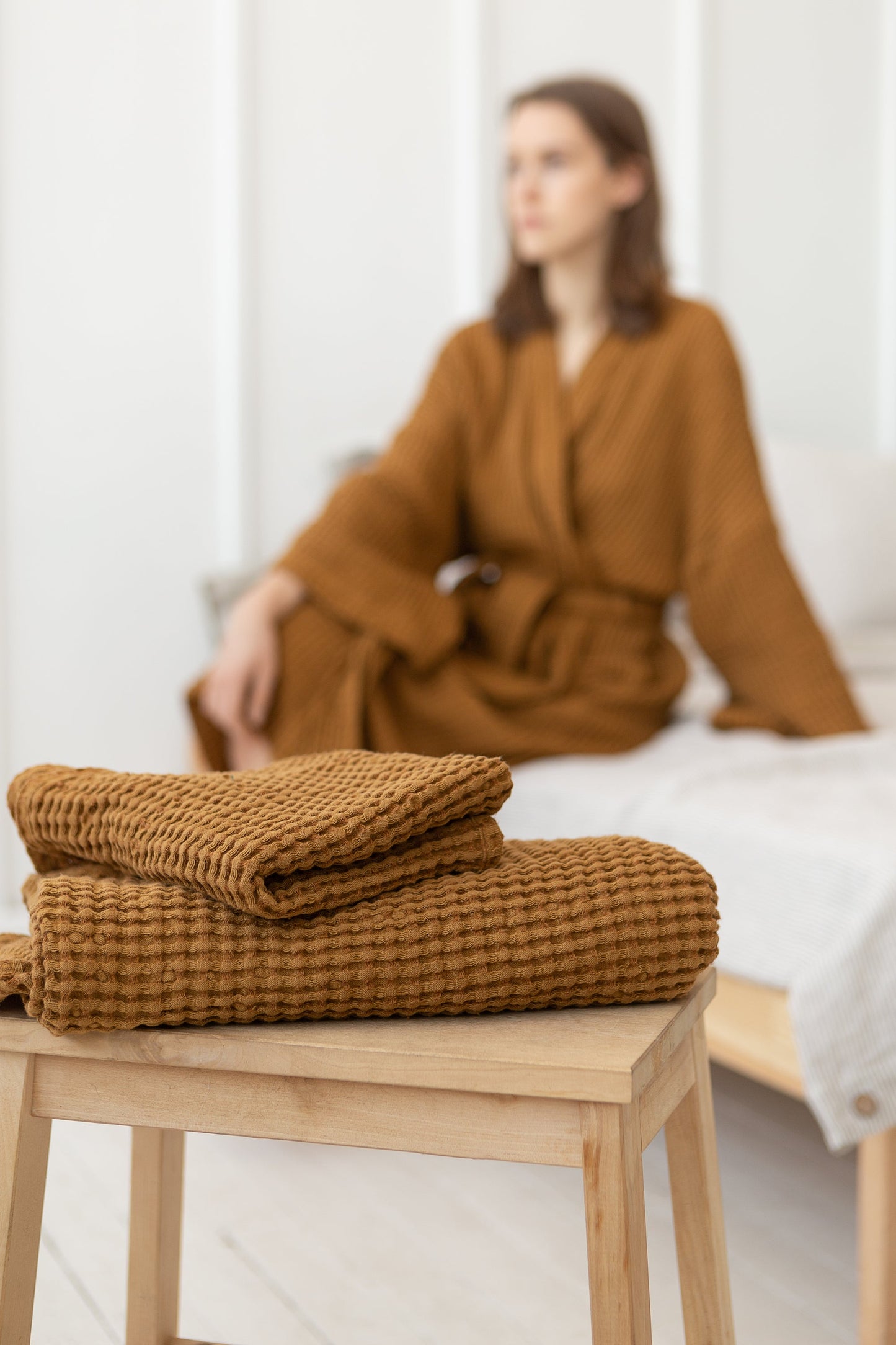 Set of linen waffle robes with towels