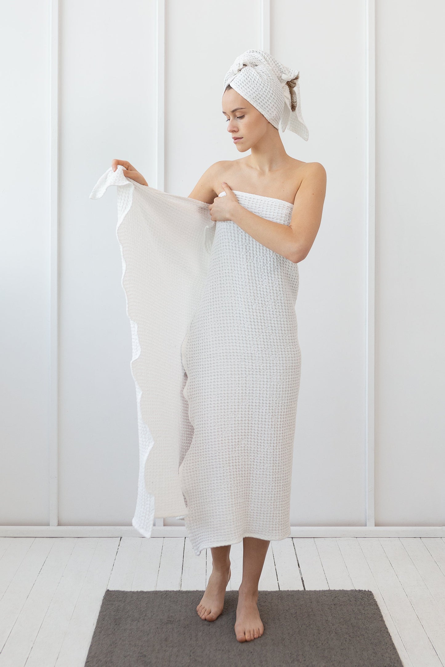 Set of linen waffle robes with towels