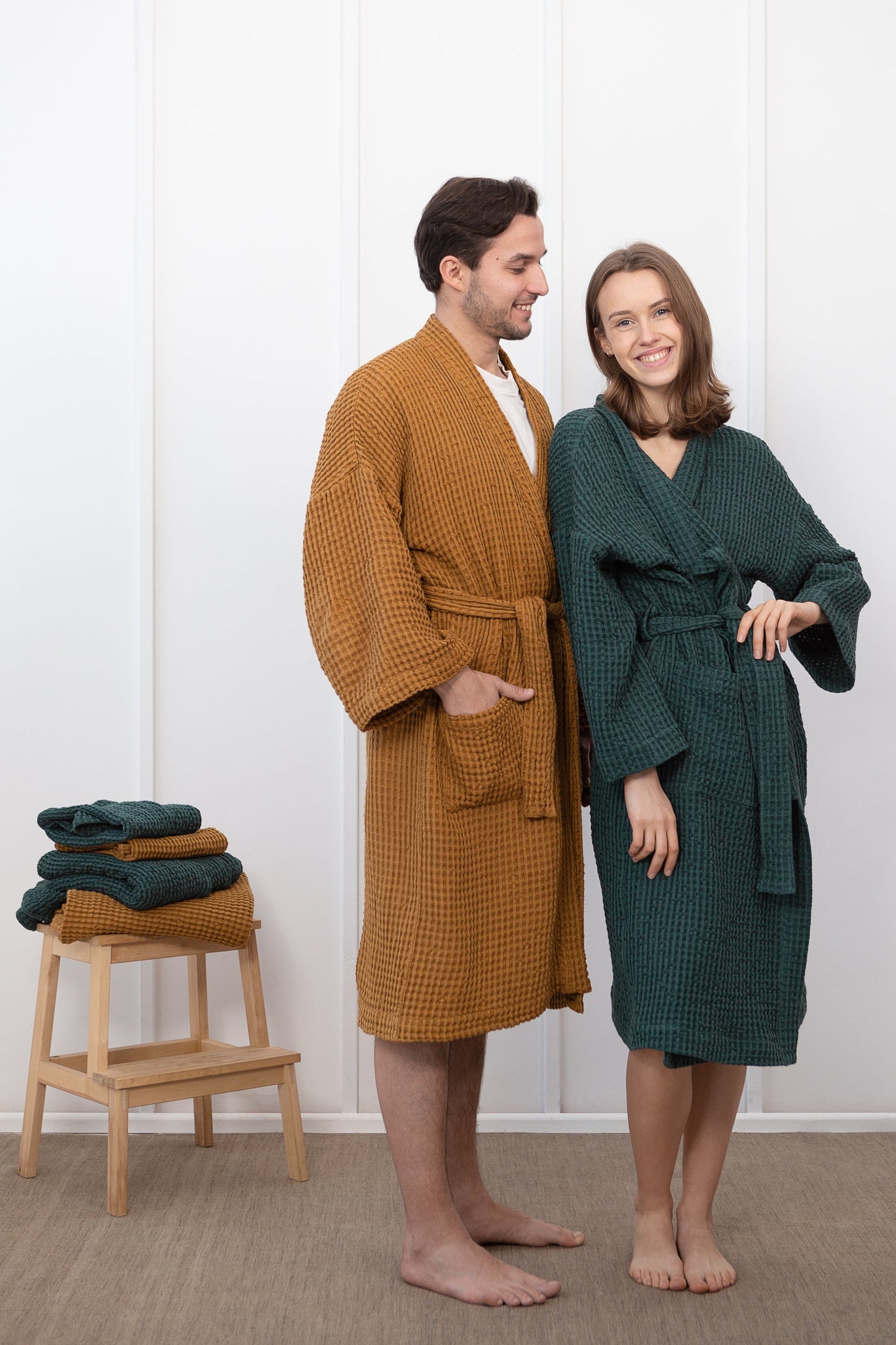 Set of linen waffle robes with towels